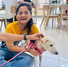 Woman with golden retriever